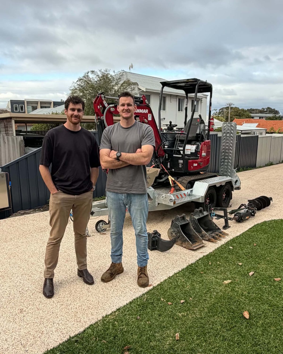 Brothers Tom and Ned Iredell, founders of TNI Plant & Equipment Hire, with one of their Yanmar mini excavators on an Apex plant trailer in Perth