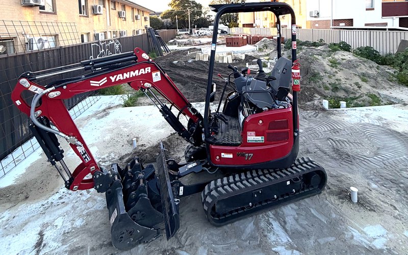 Yanmar zero tail swing mini excavator on a custom plant trailer